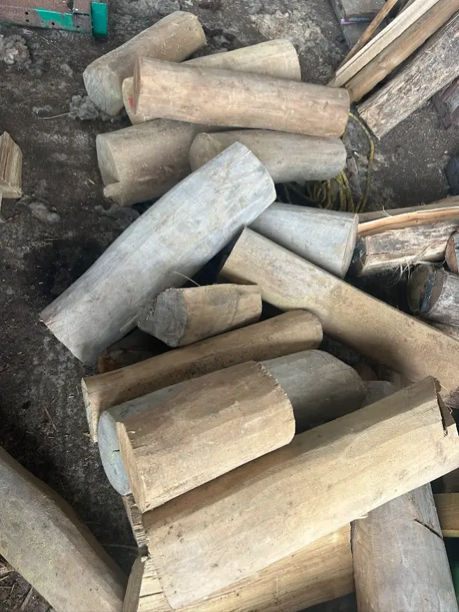 Lengths of timber at Oakfield awaiting splitting