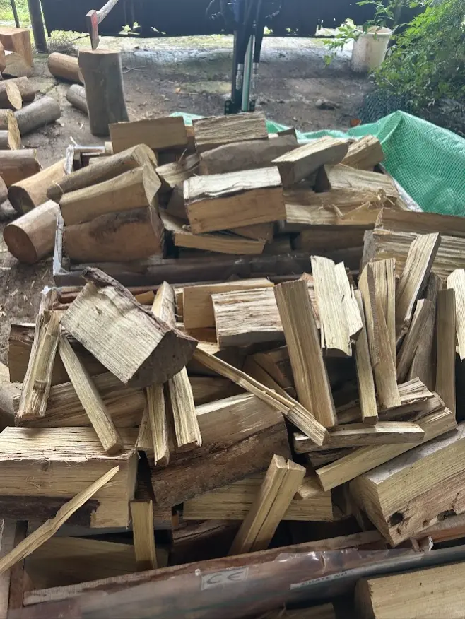 Split logs and offcuts stacked at Oakfield Farm