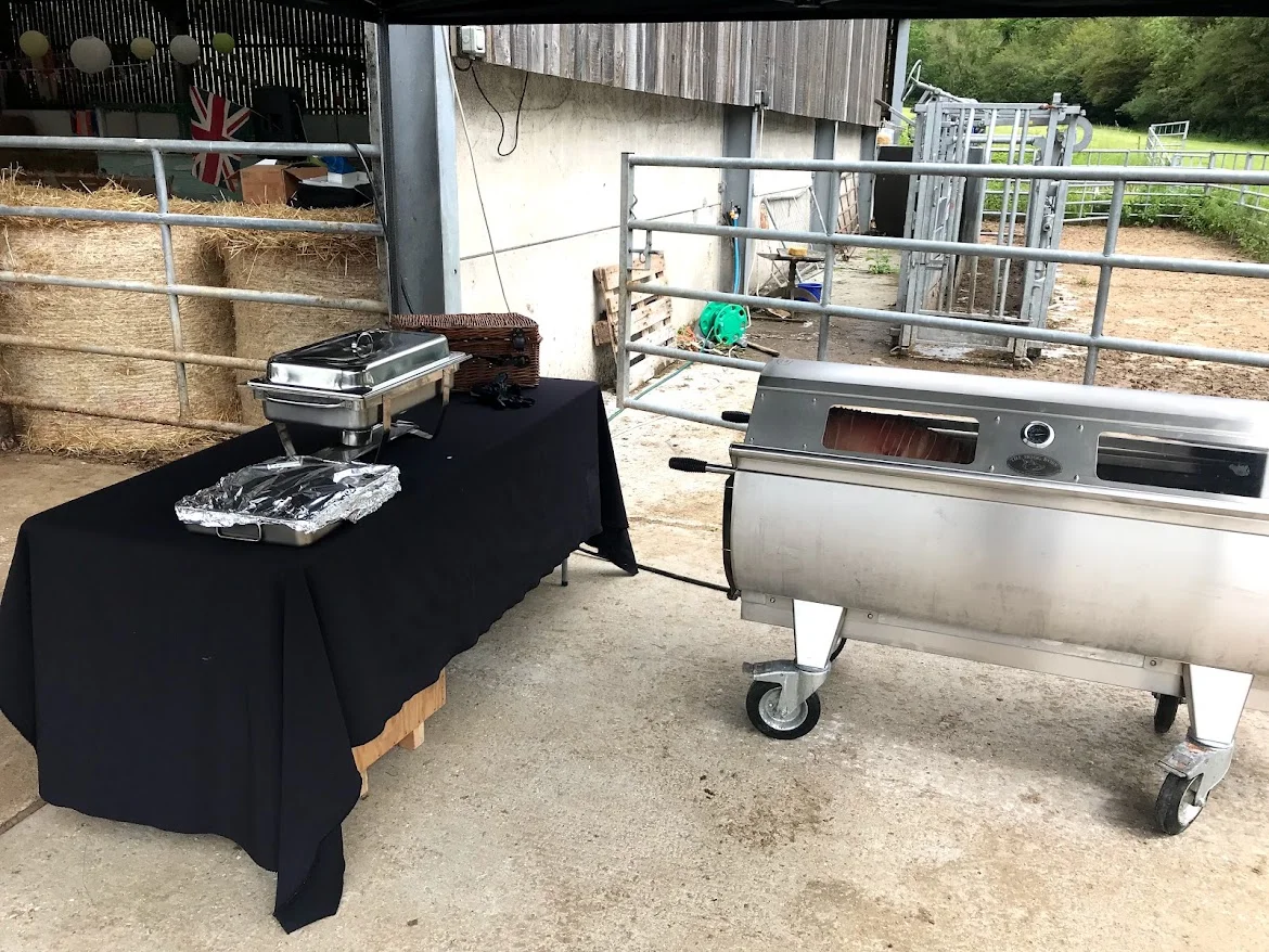 Oakfield Farm roasting machine and serving table set up at the farm